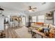 Spacious open-concept living room with modern furnishings and hardwood floors at 6271 Sunset Spring Ave, Las Vegas, NV 89122