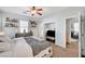 Comfortable main bedroom featuring neutral colors, ceiling fan, and shelving at 6271 Sunset Spring Ave, Las Vegas, NV 89122