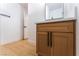 Bright bathroom with a modern vanity and wood-look flooring at 6324 Eugene Ave, Las Vegas, NV 89108
