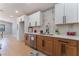 Bright kitchen with stainless steel appliances, white cabinets, and stylish backsplash at 6324 Eugene Ave, Las Vegas, NV 89108