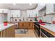 Well-equipped kitchen featuring stainless steel appliances, white countertops, and stylish cabinetry at 6324 Eugene Ave, Las Vegas, NV 89108