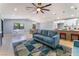 Open-concept living space showcasing a modern kitchen and comfortable seating area with stylish décor at 6324 Eugene Ave, Las Vegas, NV 89108