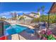 Sparkling pool and spa with patio area perfect for outdoor entertaining and lounging under the sun at 6408 Deadwood Rd, Las Vegas, NV 89108