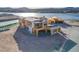 New construction home near the lake boasts contemporary architecture and waterfront views at 65 Bellissima Lago Ct, Henderson, NV 89011