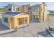 Exterior framing of a modern home with large windows and unique architectural details at 65 Bellissima Lago Ct, Henderson, NV 89011