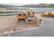 Exterior view of a new construction home with lake views and contemporary design at 65 Bellissima Lago Ct, Henderson, NV 89011