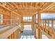 Interior framing showcases a modern staircase and open layout, with views of the lake at 65 Bellissima Lago Ct, Henderson, NV 89011