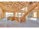 Interior framing highlights an open living space, staircase, and lake views at 65 Bellissima Lago Ct, Henderson, NV 89011