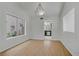 Bright dining room features hardwood floors and view to back yard at 6773 Obannon Dr, Las Vegas, NV 89146