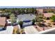 Aerial view of charming home featuring mature landscaping and a spacious driveway at 6773 Obannon Dr, Las Vegas, NV 89146