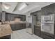 This gourmet kitchen is equipped with stainless steel appliances, granite countertops and ample cabinet space at 6773 Obannon Dr, Las Vegas, NV 89146