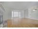 Bright living room features a fireplace, hardwood floors, and bay window at 6773 Obannon Dr, Las Vegas, NV 89146