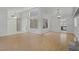 Bright living room features hardwood floors and vaulted ceilings at 6773 Obannon Dr, Las Vegas, NV 89146