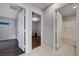 Hallway showing access to a bathroom, bedroom, and another room at 7052 Blissful Peak St, North Las Vegas, NV 89084