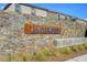 Tanglewood neighborhood sign on a stone wall with desert landscaping and modern architecture at 7052 Blissful Peak St, North Las Vegas, NV 89084