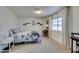 Spacious bedroom with a comfortable bed, natural light, and ample space at 718 Nectarine Ct, Henderson, NV 89014