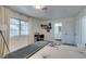 Sunlit bedroom with carpet, and view to the ensuite bathroom at 718 Nectarine Ct, Henderson, NV 89014