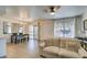 Cozy living room with comfortable seating, modern lighting, and neutral decor at 718 Nectarine Ct, Henderson, NV 89014