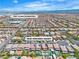 Expansive aerial view of 7545 Fontera Court neighborhood, highlighting the nearby Tony Alamo Elementary under a bright, sunny sky at 7545 Fontera Ct, Las Vegas, NV 89139