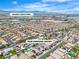 Neighborhood aerial view of 7545 Fontera Court showcasing the community and nearby Nevada Trails Park with mountain views at 7545 Fontera Ct, Las Vegas, NV 89139