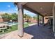 Beautiful backyard with pool, spa, and covered patio, perfect for relaxing and entertaining at 7545 Fontera Ct, Las Vegas, NV 89139