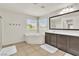 Relaxing bathroom features a soaking tub, separate shower, and dual sink vanity at 7545 Fontera Ct, Las Vegas, NV 89139