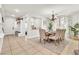 Dining area featuring a dining table, chairs, and stylish decor in an open-concept layout at 7545 Fontera Ct, Las Vegas, NV 89139