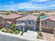 Gorgeous two-story home featuring a three-car garage and well maintained landscaping at 7545 Fontera Ct, Las Vegas, NV 89139
