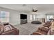 Upstairs loft area with multiple seating options and stairs at 7545 Fontera Ct, Las Vegas, NV 89139