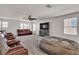 Loft with leather couches, large beanbag and TV at 7545 Fontera Ct, Las Vegas, NV 89139