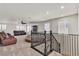 Spacious loft with carpet, ceiling fan, and comfortable seating at 7545 Fontera Ct, Las Vegas, NV 89139