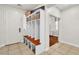 Functional mud room featuring built-in storage, hooks, and a bench for organization at 7545 Fontera Ct, Las Vegas, NV 89139