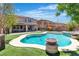 Backyard pool and spa with an outdoor water feature, perfect for relaxation and entertaining at 7545 Fontera Ct, Las Vegas, NV 89139