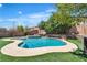 Relaxing pool and spa area, surrounded by lush greenery and mature trees for added privacy at 7545 Fontera Ct, Las Vegas, NV 89139