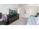 Bedroom featuring bed, dresser, and TV mounted on the wall at 7885 W Flamingo Rd # 1161, Las Vegas, NV 89147
