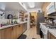 Bright kitchen with modern cabinets, stainless steel appliances, and white countertops at 7885 W Flamingo Rd # 1161, Las Vegas, NV 89147