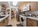 Bright kitchen with modern cabinets, stainless steel appliances, and white countertops at 7885 W Flamingo Rd # 1161, Las Vegas, NV 89147