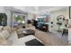 Inviting living room with modern decor, plush sofa, and access to bedroom at 7885 W Flamingo Rd # 1161, Las Vegas, NV 89147