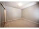 Cozy bedroom with neutral carpet, ample closet space, and a clean, inviting atmosphere at 7911 Canoe Ln, Las Vegas, NV 89145