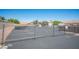 Fenced parking area with spaces for RV and boat parking at 7911 Canoe Ln, Las Vegas, NV 89145