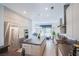 Bright kitchen featuring custom cabinetry, stainless appliances, and center island at 7940 Castle Pines Ave, Las Vegas, NV 89113