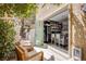 Inviting patio with outdoor seating adjacent to a fully stocked wet bar at 7940 Castle Pines Ave, Las Vegas, NV 89113