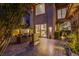 Outdoor living space boasts a stone fountain, comfortable seating and convenient access to the house at 7940 Castle Pines Ave, Las Vegas, NV 89113