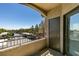 Private balcony overlooking the parking area, offering a relaxing outdoor space at 8250 N Grand Canyon Dr # 2001, Las Vegas, NV 89166