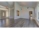 Expansive living room features soaring ceilings, hardwood floors, and neutral paint at 8300 Slate Harbor Cir, Las Vegas, NV 89128