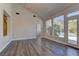 This spacious living room features hardwood floors, neutral paint, and abundant natural light at 8300 Slate Harbor Cir, Las Vegas, NV 89128