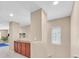 Upstairs hallway with decorative cabinet at 8335 Martinborough Ave, Las Vegas, NV 89131