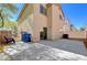 Private backyard with sliding door access and a concrete patio at 8396 Pearl Beach Ct, Las Vegas, NV 89139