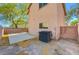 Cozy backyard with a patio, AC unit, and brick perimeter wall at 8396 Pearl Beach Ct, Las Vegas, NV 89139