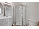 All-white bathroom featuring a glass shower at 8396 Pearl Beach Ct, Las Vegas, NV 89139
